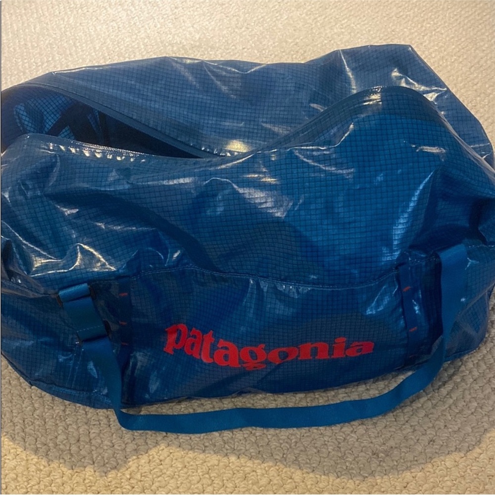Patagonia Blue Duffel Bag with Glossy Finish